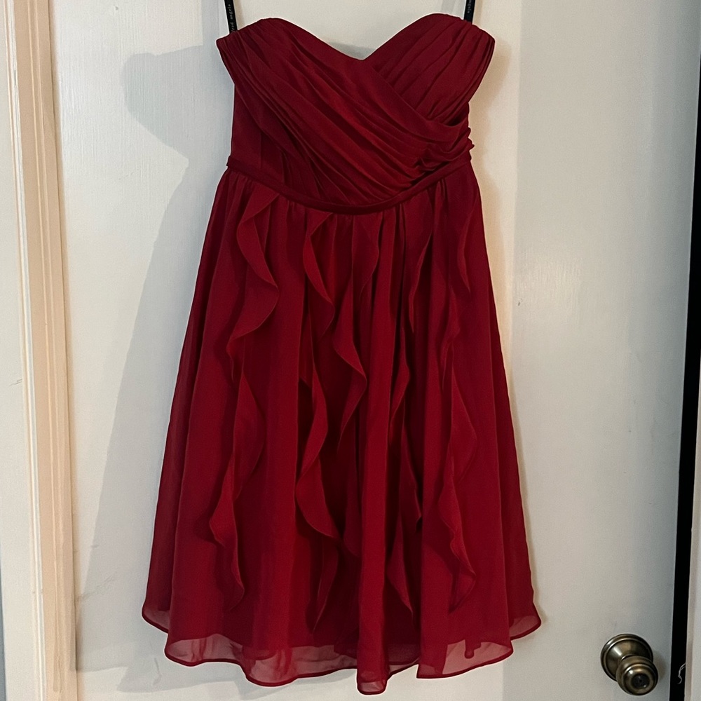 Beautiful cocktail, formal, or bridesmaid dress in the color Claret.